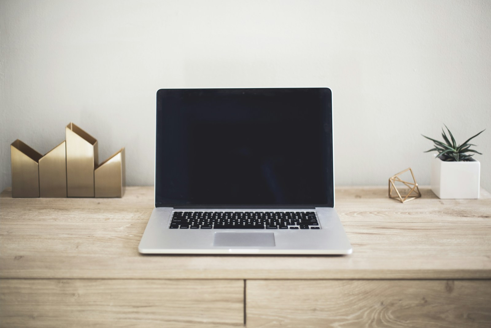 A clean laptop workspace with a bright screen